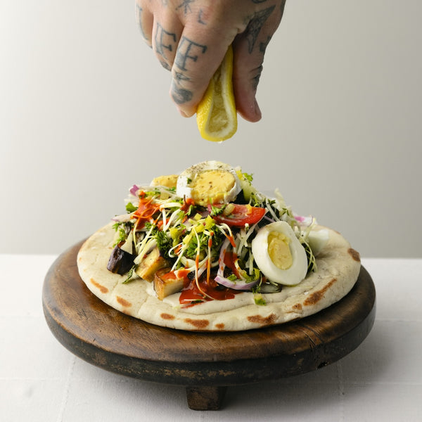 Matty Matheson's Sabich with Cucumber, Tomato, and Pickled Hot Peppers