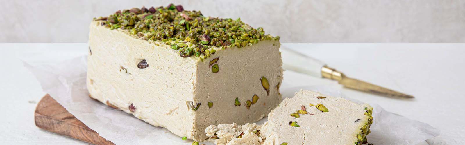 Pistachio Halva loaf cake on a cutting board